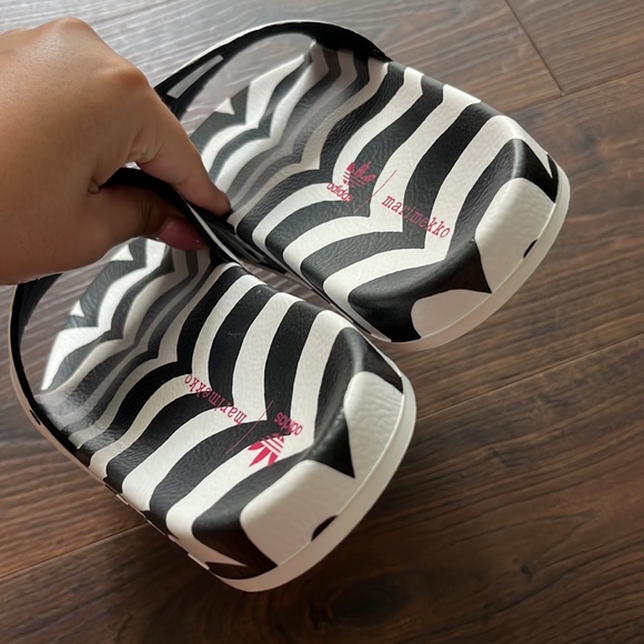adidas Get comfortable. Slip into a slower pace in these adidas slides. A cozy version of the 
